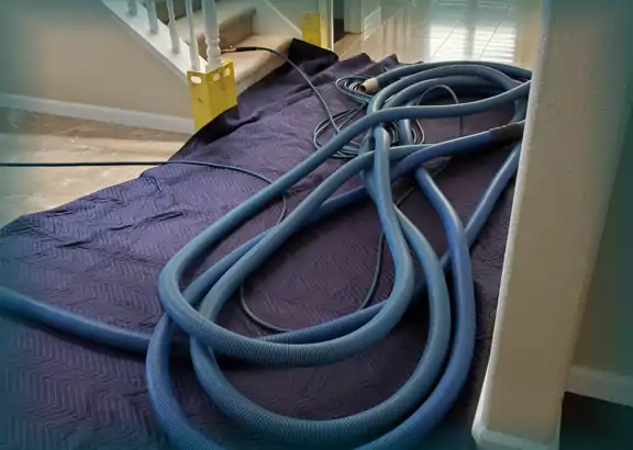 Protecting wall corners and floor for carpet cleaning