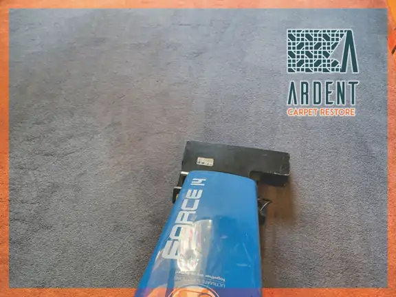 Vacuuming the carpet before cleaning