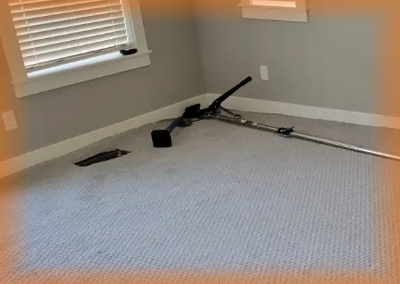 Power stretcher being used on carpet